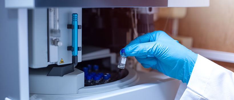 LCMS machine being loaded with samples in laboratory