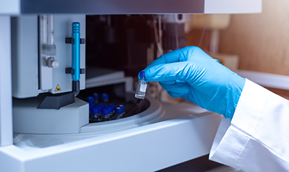 LCMS machine being loaded with samples in laboratory