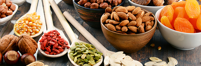 Dry foods in bowls on table