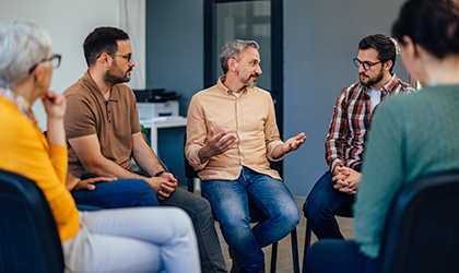 Group of people undertaking focus group research