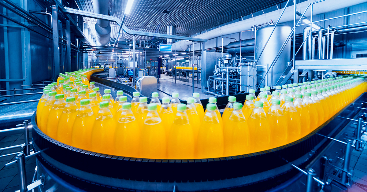 Orange juice on a production line in food and drink factory