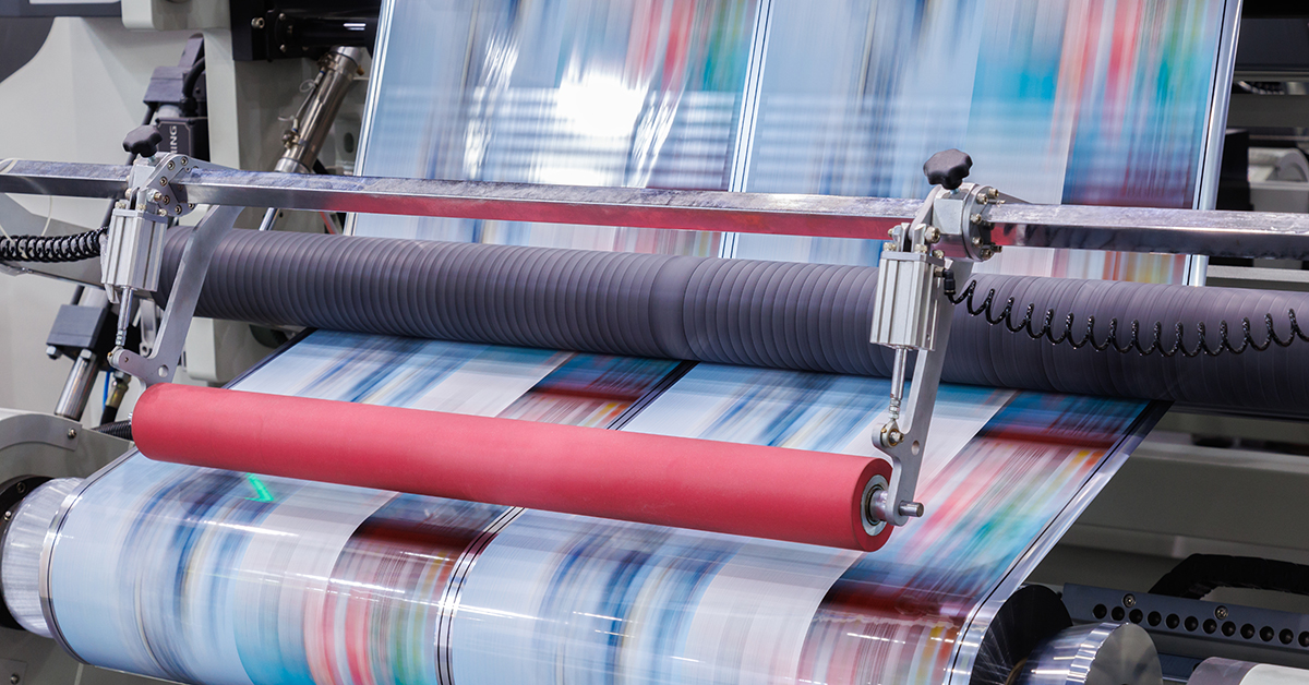 Printed labels moving around a production line