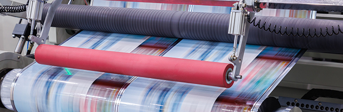 Printed labels moving around a production line