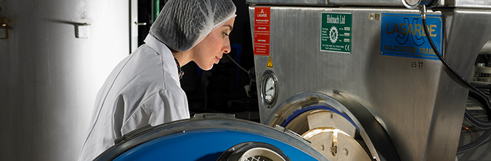 Plant worker loading retort