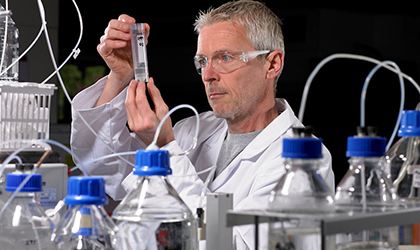 Scientist performing analytical work in laboratory