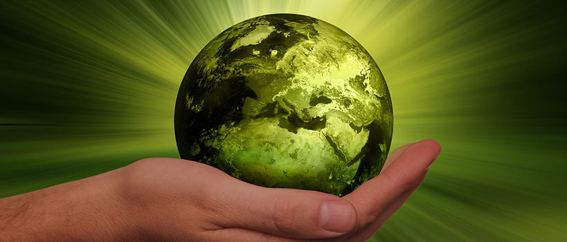 Sustainability globe graphic in hand