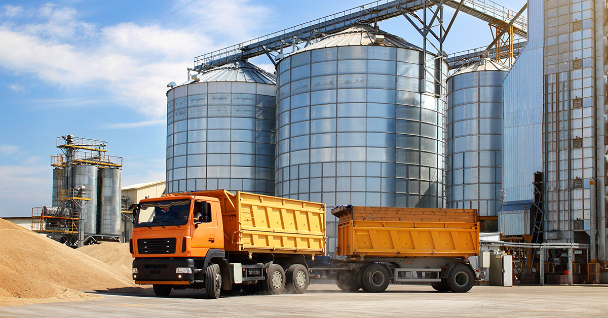 Yellow truck outside of supply factory