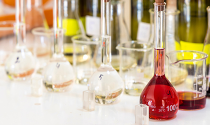 Wine in volumetric flask in laboratory
